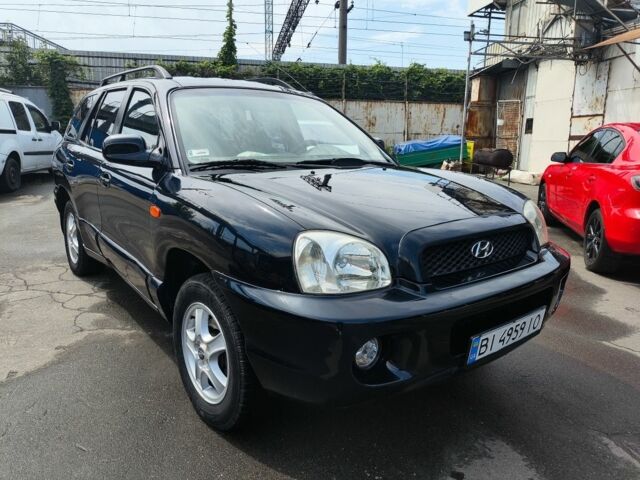Синий Хендай Санта Фе, объемом двигателя 2 л и пробегом 370 тыс. км за 5999 $, фото 1 на Automoto.ua