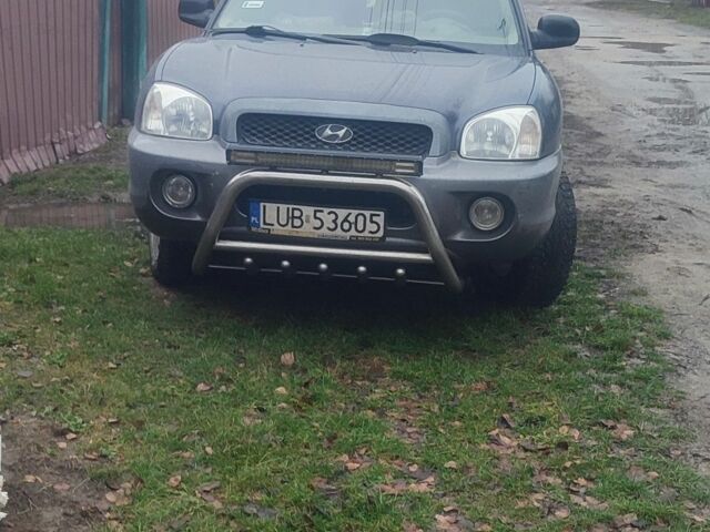 Синий Хендай Санта Фе, объемом двигателя 2 л и пробегом 253 тыс. км за 2952 $, фото 1 на Automoto.ua