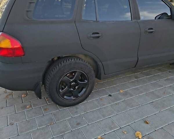 Хендай Санта Фе 2004 в Черкассах на Automoto.ua Синий Хендай Санта Фе, объемом двигателя 1.99 л и пробегом 355 тыс. км за 4900 $, фото 3 на Automoto.ua