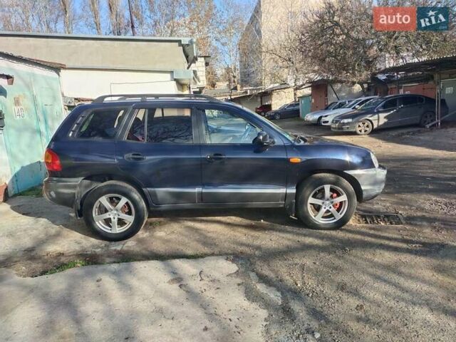 Синий Хендай Санта Фе, объемом двигателя 2.4 л и пробегом 293 тыс. км за 3500 $, фото 4 на Automoto.ua