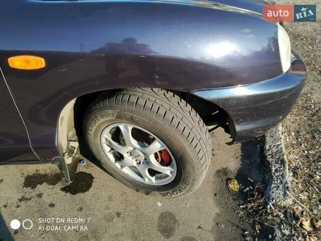 Синий Хендай Санта Фе, объемом двигателя 2.02 л и пробегом 330 тыс. км за 5000 $, фото 3 на Automoto.ua