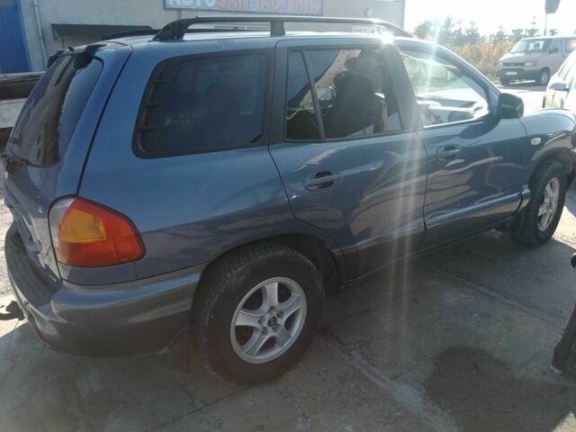 Синий Хендай Санта Фе, объемом двигателя 2.2 л и пробегом 300 тыс. км за 3264 $, фото 5 на Automoto.ua