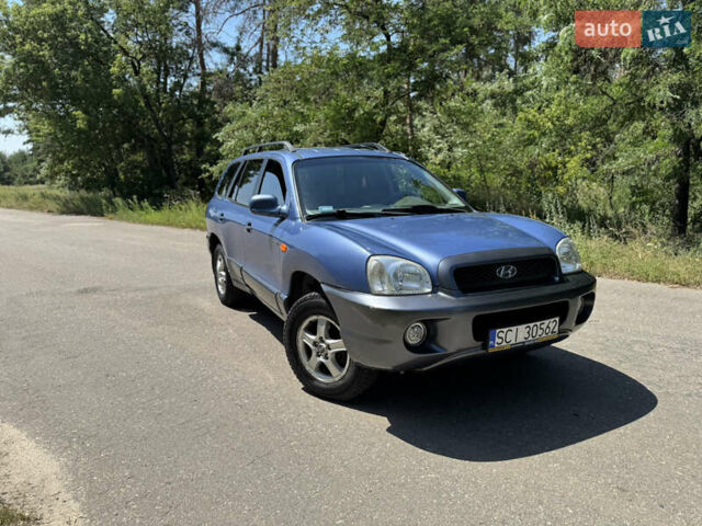 Синий Хендай Санта Фе, объемом двигателя 2 л и пробегом 225 тыс. км за 4800 $, фото 1 на Automoto.ua