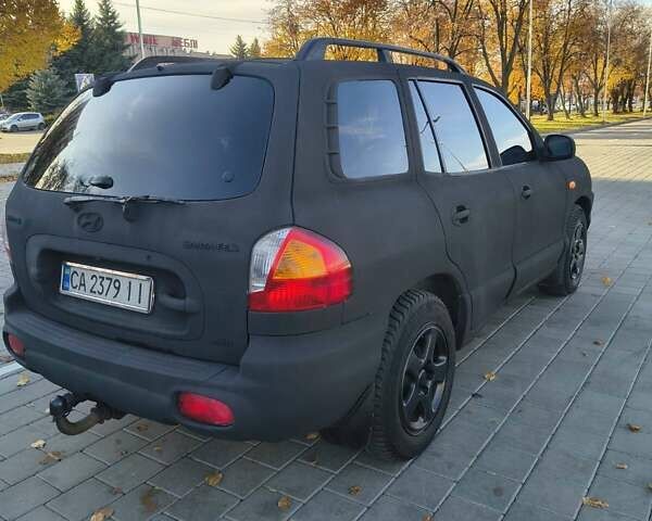Хендай Санта Фе 2004 в Черкассах на Automoto.ua Синий Хендай Санта Фе, объемом двигателя 1.99 л и пробегом 355 тыс. км за 4900 $, фото 1 на Automoto.ua