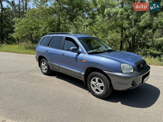 Синий Хендай Санта Фе, объемом двигателя 2 л и пробегом 225 тыс. км за 4800 $, фото 3 на Automoto.ua