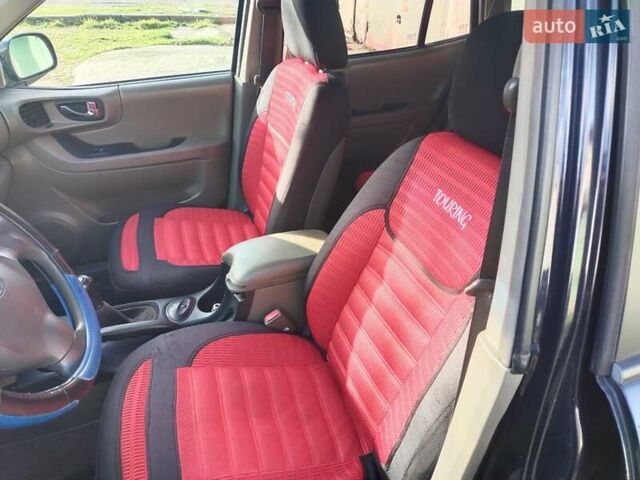 Синий Хендай Санта Фе, объемом двигателя 2.4 л и пробегом 293 тыс. км за 3500 $, фото 10 на Automoto.ua