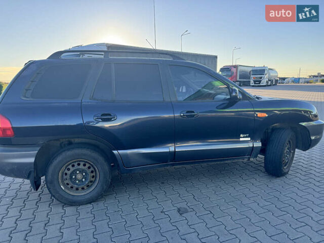 Синий Хендай Санта Фе, объемом двигателя 2.35 л и пробегом 240 тыс. км за 5300 $, фото 3 на Automoto.ua