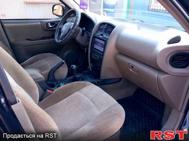 Синий Хендай Санта Фе, объемом двигателя 2 л и пробегом 241 тыс. км за 5800 $, фото 10 на Automoto.ua