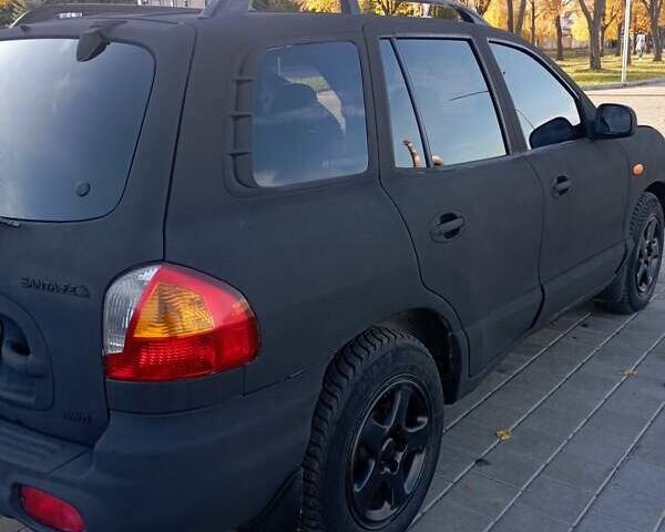 Хендай Санта Фе 2004 в Черкассах на Automoto.ua Синий Хендай Санта Фе, объемом двигателя 1.99 л и пробегом 355 тыс. км за 4900 $, фото 18 на Automoto.ua