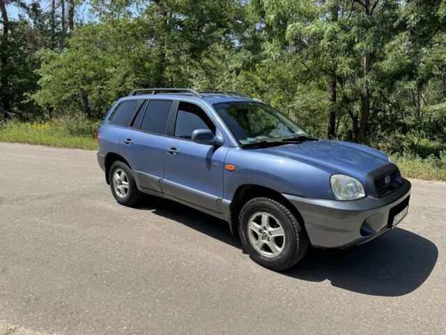 Синий Хендай Санта Фе, объемом двигателя 2 л и пробегом 225 тыс. км за 4800 $, фото 3 на Automoto.ua