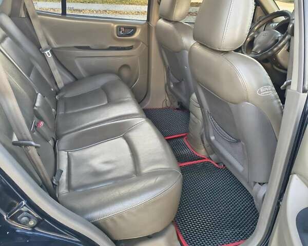 Хендай Санта Фе 2004 в Черкассах на Automoto.ua Синий Хендай Санта Фе, объемом двигателя 1.99 л и пробегом 355 тыс. км за 4900 $, фото 5 на Automoto.ua