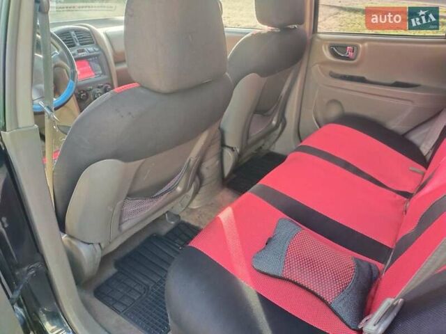 Синий Хендай Санта Фе, объемом двигателя 2.4 л и пробегом 293 тыс. км за 3500 $, фото 11 на Automoto.ua