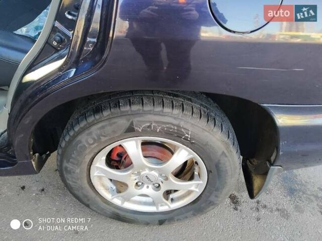 Синий Хендай Санта Фе, объемом двигателя 2.02 л и пробегом 330 тыс. км за 5000 $, фото 4 на Automoto.ua