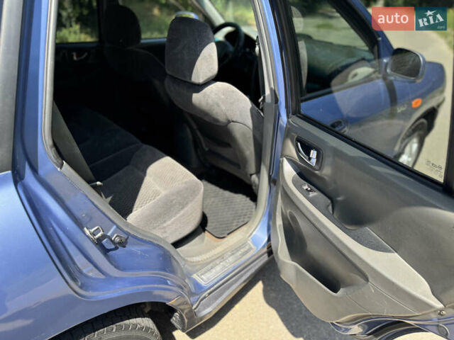 Синий Хендай Санта Фе, объемом двигателя 2 л и пробегом 225 тыс. км за 4800 $, фото 10 на Automoto.ua