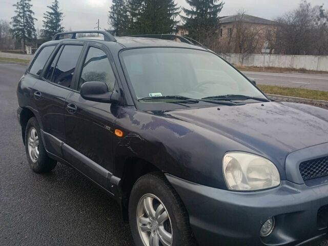 Синий Хендай Санта Фе, объемом двигателя 2 л и пробегом 262 тыс. км за 2300 $, фото 7 на Automoto.ua