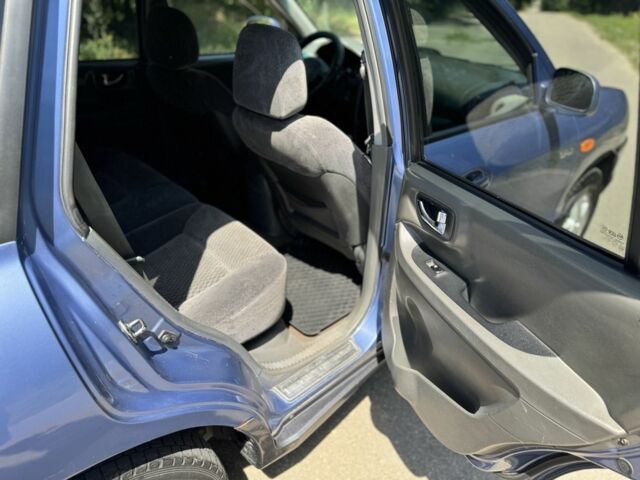 Синий Хендай Санта Фе, объемом двигателя 2 л и пробегом 225 тыс. км за 4800 $, фото 9 на Automoto.ua