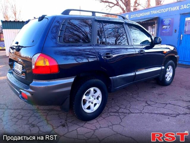 Синий Хендай Санта Фе, объемом двигателя 2 л и пробегом 241 тыс. км за 5800 $, фото 1 на Automoto.ua