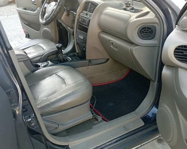 Хендай Санта Фе 2004 в Черкассах на Automoto.ua Синий Хендай Санта Фе, объемом двигателя 1.99 л и пробегом 355 тыс. км за 4900 $, фото 12 на Automoto.ua