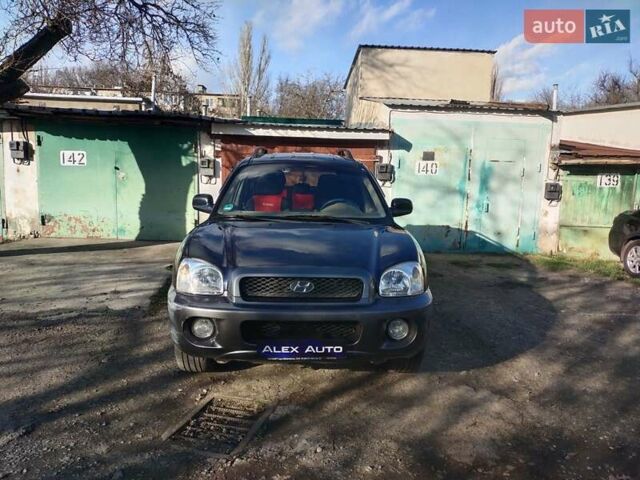 Синий Хендай Санта Фе, объемом двигателя 2.4 л и пробегом 293 тыс. км за 3500 $, фото 7 на Automoto.ua