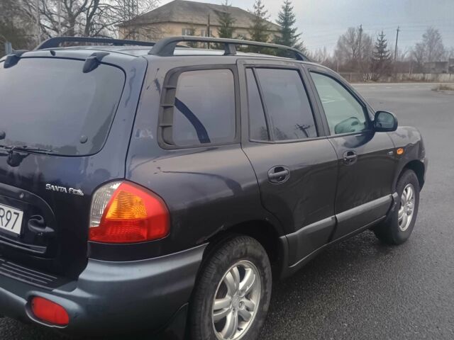 Синий Хендай Санта Фе, объемом двигателя 2 л и пробегом 262 тыс. км за 2300 $, фото 4 на Automoto.ua