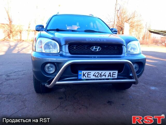 Синий Хендай Санта Фе, объемом двигателя 2 л и пробегом 241 тыс. км за 5800 $, фото 6 на Automoto.ua