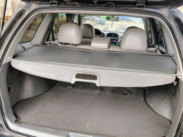 Синий Хендай Санта Фе, объемом двигателя 1.9 л и пробегом 250 тыс. км за 4000 $, фото 7 на Automoto.ua