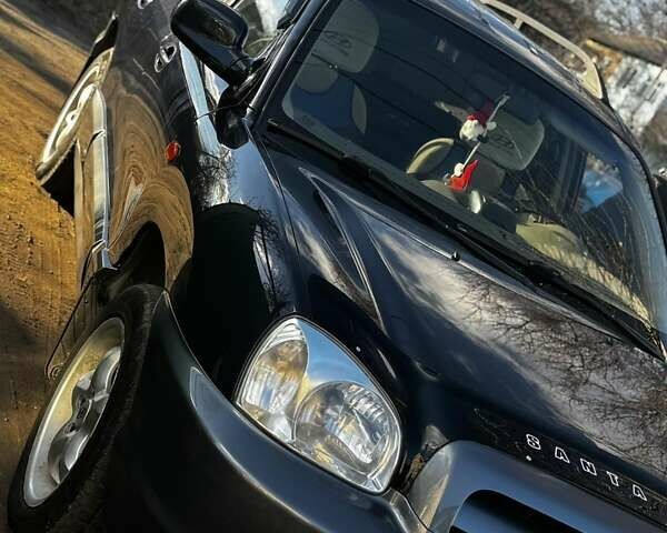 Синій Хендай Санта Фе, об'ємом двигуна 2 л та пробігом 325 тис. км за 6800 $, фото 2 на Automoto.ua
