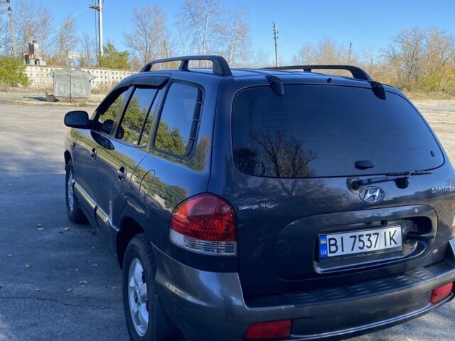 Синій Хендай Санта Фе, об'ємом двигуна 2.7 л та пробігом 257 тис. км за 5750 $, фото 4 на Automoto.ua