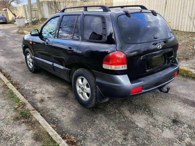 Синий Хендай Санта Фе, объемом двигателя 1.9 л и пробегом 250 тыс. км за 4000 $, фото 2 на Automoto.ua
