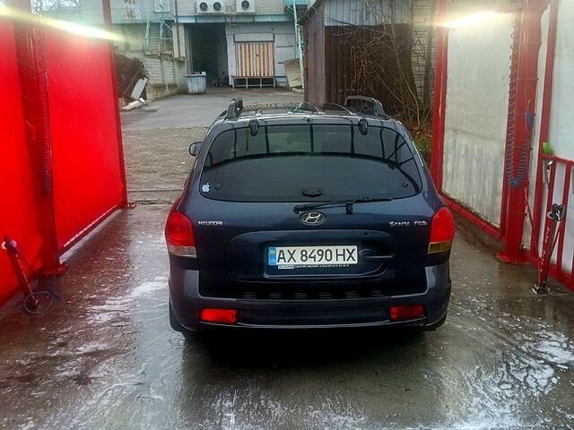 Синий Хендай Санта Фе, объемом двигателя 2 л и пробегом 280 тыс. км за 6300 $, фото 6 на Automoto.ua