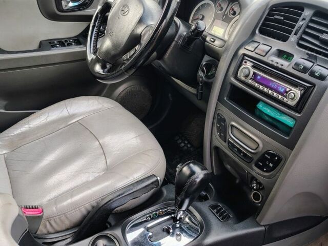 Синий Хендай Санта Фе, объемом двигателя 1.9 л и пробегом 250 тыс. км за 4000 $, фото 5 на Automoto.ua