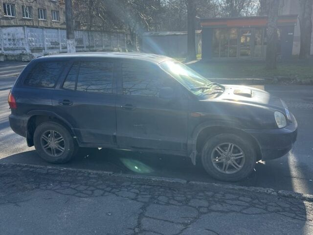 Синий Хендай Санта Фе, объемом двигателя 2 л и пробегом 290 тыс. км за 3200 $, фото 5 на Automoto.ua