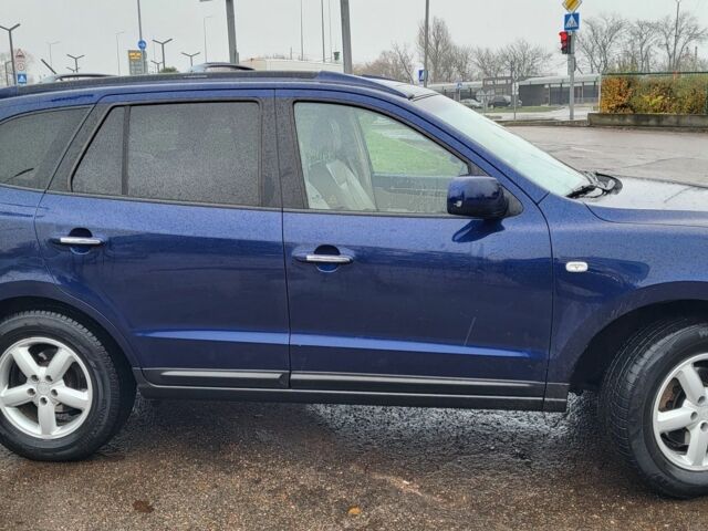 Синий Хендай Санта Фе, объемом двигателя 2.2 л и пробегом 291 тыс. км за 8500 $, фото 3 на Automoto.ua