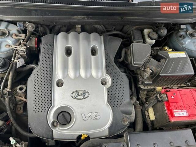 Синий Хендай Санта Фе, объемом двигателя 2.66 л и пробегом 261 тыс. км за 9000 $, фото 17 на Automoto.ua