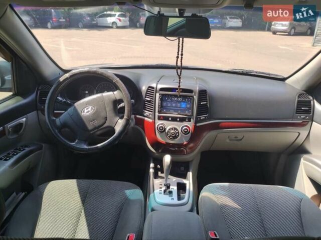 Синий Хендай Санта Фе, объемом двигателя 2.7 л и пробегом 358 тыс. км за 7700 $, фото 3 на Automoto.ua