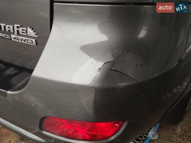 Синий Хендай Санта Фе, объемом двигателя 2.19 л и пробегом 294 тыс. км за 6000 $, фото 4 на Automoto.ua