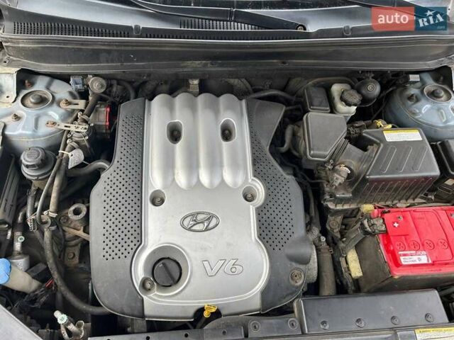 Синий Хендай Санта Фе, объемом двигателя 2.66 л и пробегом 261 тыс. км за 9000 $, фото 18 на Automoto.ua
