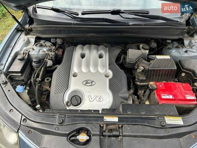 Синий Хендай Санта Фе, объемом двигателя 2.66 л и пробегом 261 тыс. км за 9000 $, фото 16 на Automoto.ua