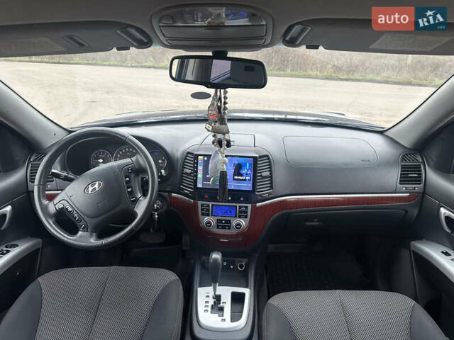 Синій Хендай Санта Фе, об'ємом двигуна 2.68 л та пробігом 239 тис. км за 9499 $, фото 8 на Automoto.ua