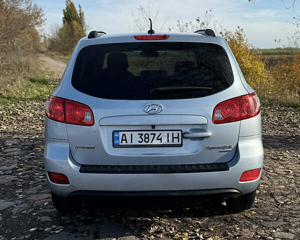 Синий Хендай Санта Фе, объемом двигателя 2.66 л и пробегом 230 тыс. км за 7900 $, фото 3 на Automoto.ua