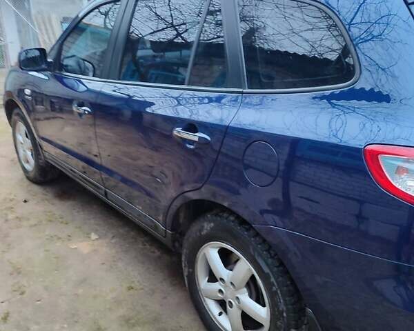 Синий Хендай Санта Фе, объемом двигателя 2.2 л и пробегом 200 тыс. км за 10700 $, фото 3 на Automoto.ua