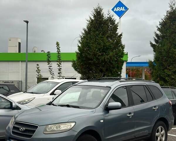 Синий Хендай Санта Фе, объемом двигателя 2.19 л и пробегом 320 тыс. км за 9500 $, фото 1 на Automoto.ua