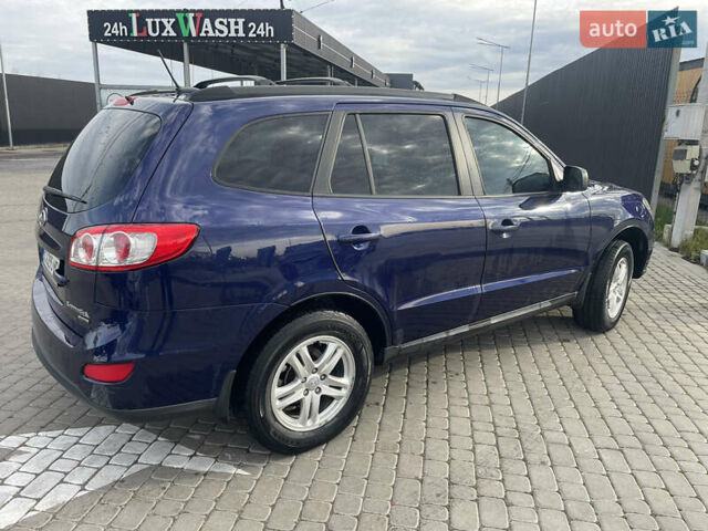 Синий Хендай Санта Фе, объемом двигателя 2.36 л и пробегом 300 тыс. км за 8750 $, фото 1 на Automoto.ua