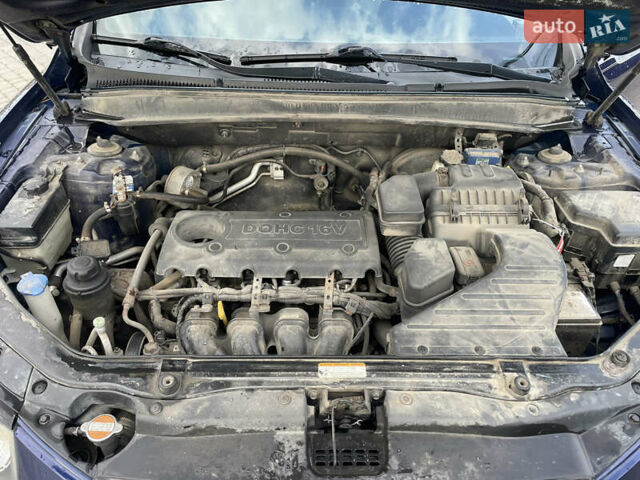 Синий Хендай Санта Фе, объемом двигателя 2.36 л и пробегом 300 тыс. км за 8750 $, фото 10 на Automoto.ua