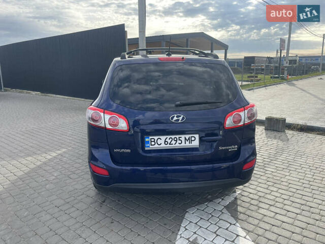 Синий Хендай Санта Фе, объемом двигателя 2.36 л и пробегом 300 тыс. км за 8750 $, фото 2 на Automoto.ua