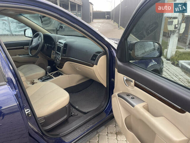 Синий Хендай Санта Фе, объемом двигателя 2.36 л и пробегом 300 тыс. км за 8750 $, фото 5 на Automoto.ua
