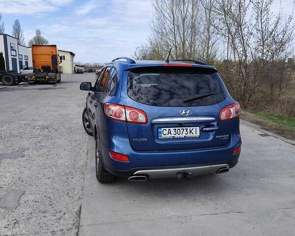 Синий Хендай Санта Фе, объемом двигателя 2.2 л и пробегом 170 тыс. км за 13000 $, фото 6 на Automoto.ua