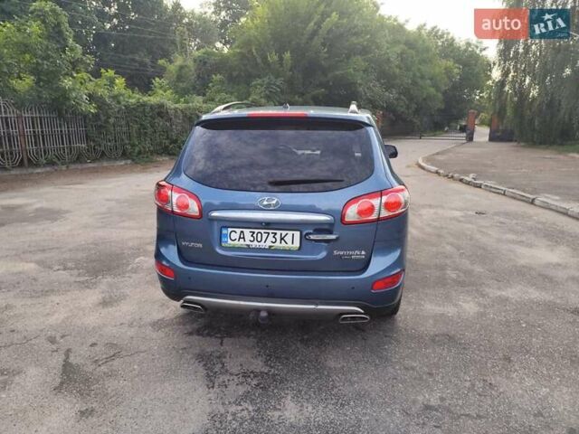 Синий Хендай Санта Фе, объемом двигателя 2.2 л и пробегом 170 тыс. км за 13000 $, фото 2 на Automoto.ua