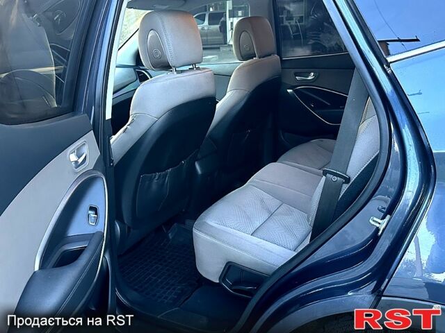 Синій Хендай Санта Фе, об'ємом двигуна 2.4 л та пробігом 155 тис. км за 14500 $, фото 12 на Automoto.ua
