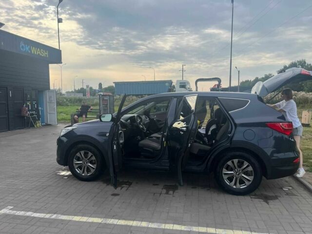 Синий Хендай Санта Фе, объемом двигателя 2.4 л и пробегом 185 тыс. км за 10700 $, фото 3 на Automoto.ua